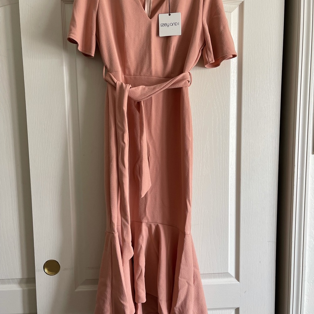 Salmon pink event dress.